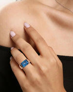 Model wearing Emerald Cut Topaz Silver Ring, ideal Anniversary or Birthday Gift gift