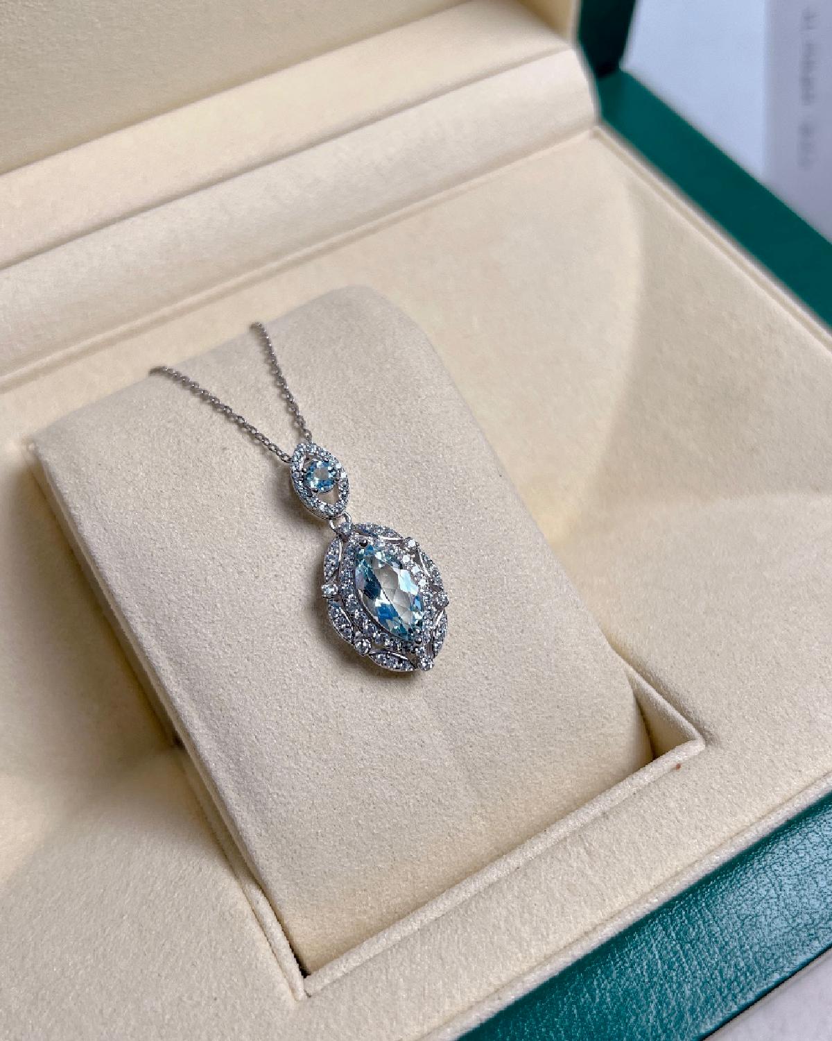 Macro shot of Halo aquamarine pendant sterling silver featuring Blue Aquamarine