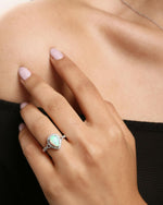 Model wearing Halo Opal Ring Sterling Silver, ideal Anniversary or Promise Ring gift
