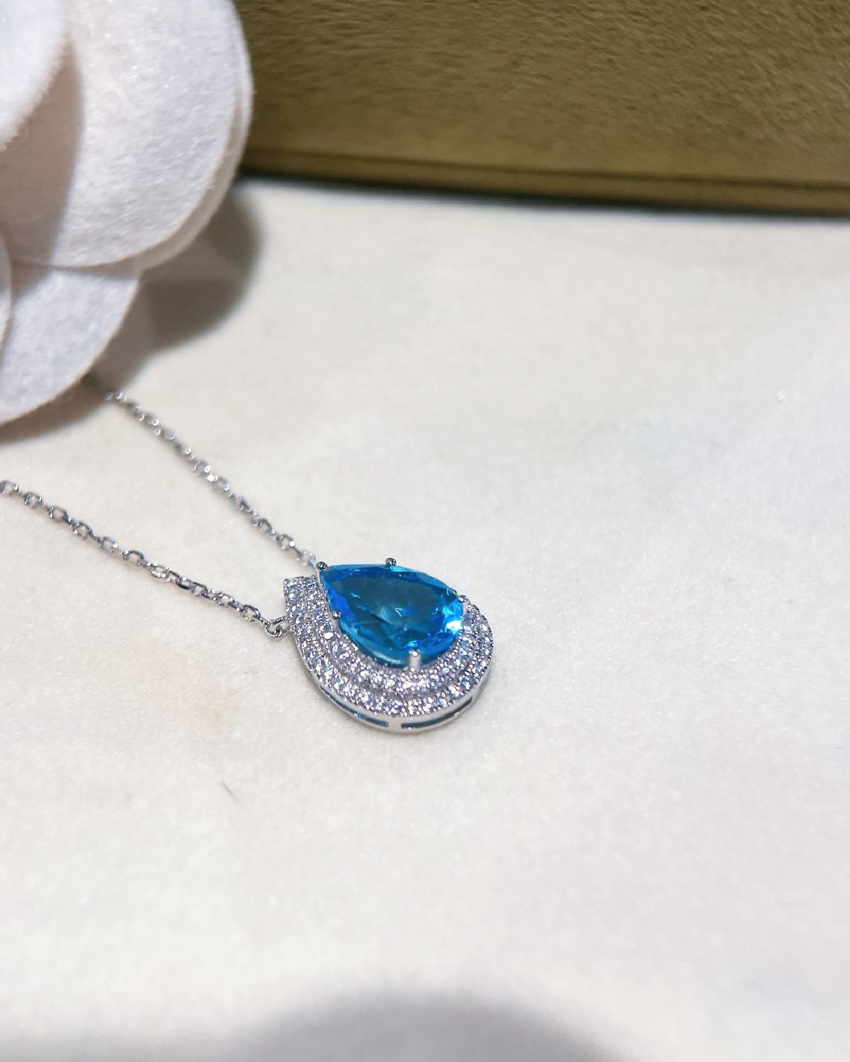Halo swiss blue topaz necklace silver featuring Swiss Blue Topaz