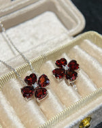 Lifestyle photography of Heart cut garnet necklace red featuring Heart Cut center stone