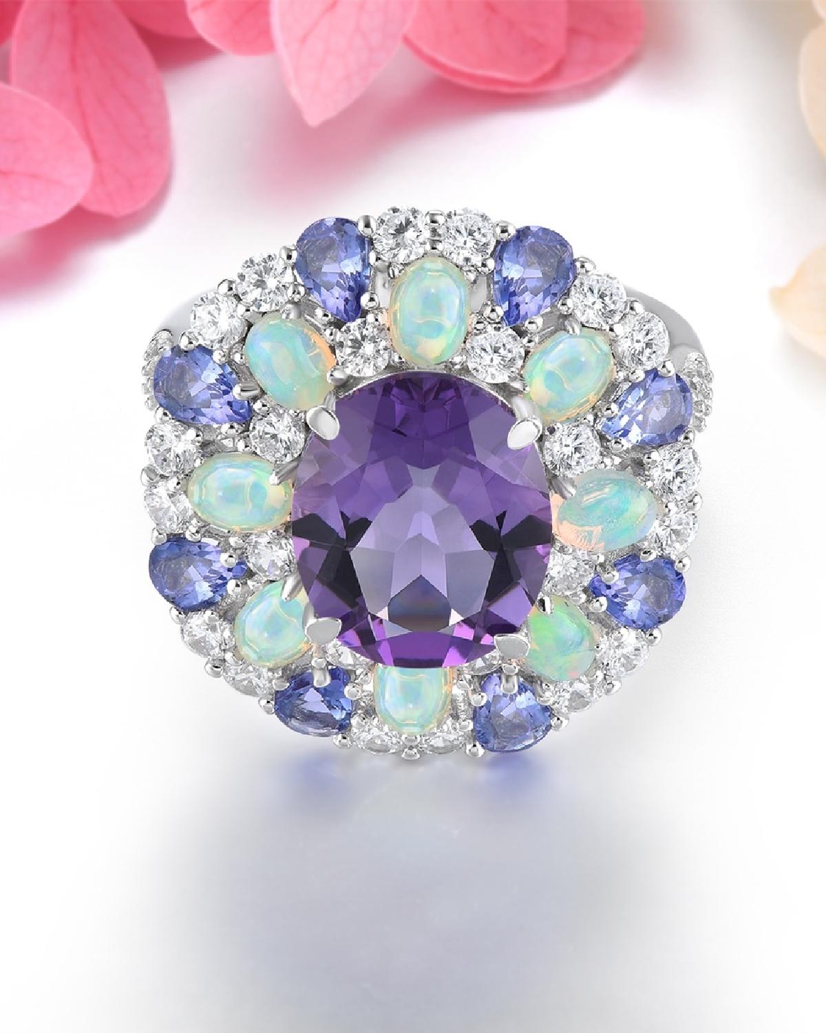 Lifestyle photography of Oval amethyst ring floral halo featuring Oval Cut center stone