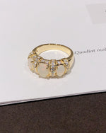 Lifestyle photography of Oval cabochon opal ring gold plated featuring Oval Cabochon center stone