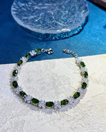 Lifestyle photography of Oval cut diopside floral bracelet featuring Oval Cut center stone