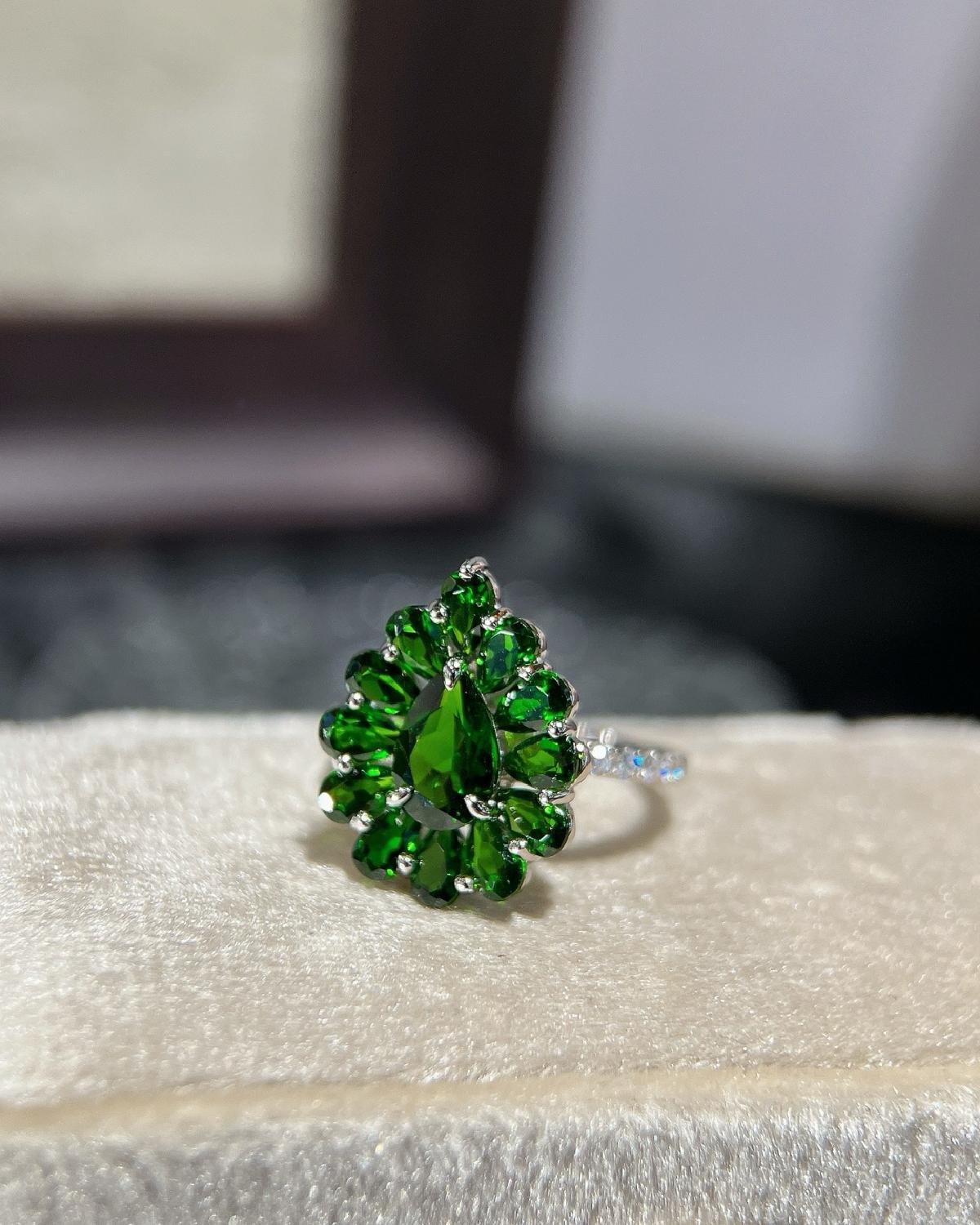 Lifestyle photography of Oval Cut Diopside Floral Ring featuring Oval Cut center stone