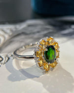 Lifestyle photography of Oval cut green diopside ring featuring Oval Cut center stone