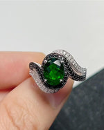 Lifestyle photography of Oval Diopside Ring Swirl Design featuring Oval Cut center stone