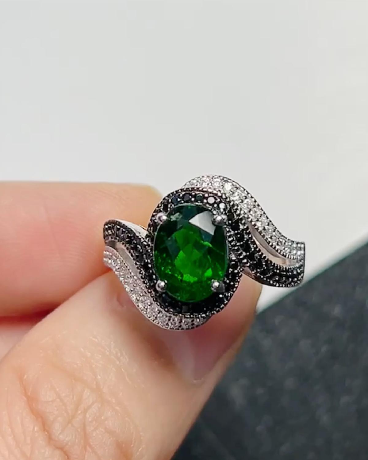 Lifestyle photography of Oval Diopside Ring Swirl Design featuring Oval Cut center stone