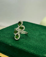 Lifestyle photography of Pear cut diopside halo ring featuring Pear Cut center stone